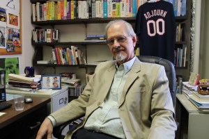 Dr. Thomas Manshiem of the Saint Peter's University Sociology Department sitting in his office.
